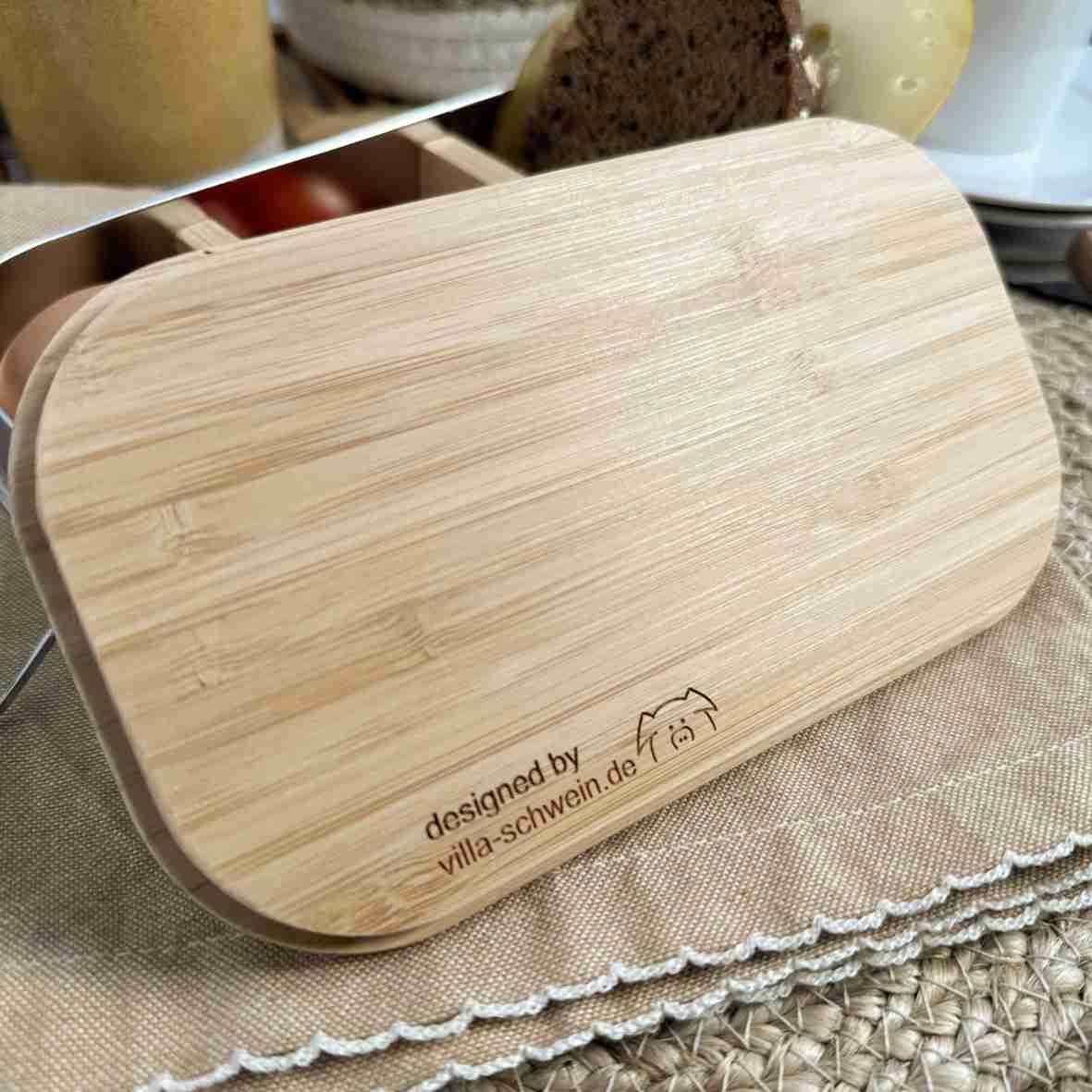 Bambusdeckel-Rückseite der Brotdose mit Villa-Schwein-Logo