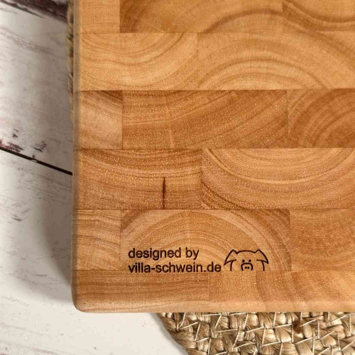 Stirnholz-Schneidebrett Detail mit Villa-Schwein-Logogravur