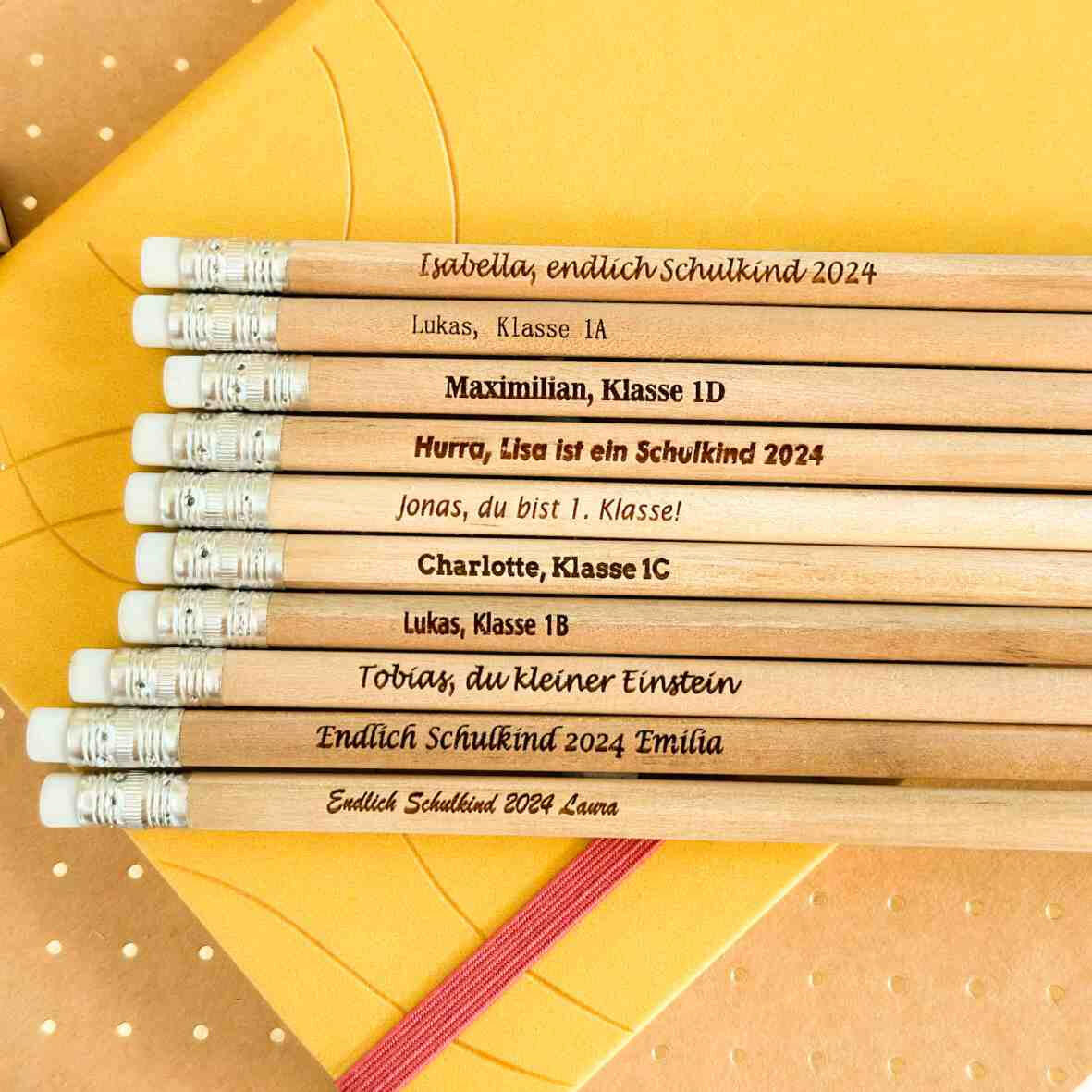 Personalisierter Bleistift mit Gravur und Radiergummi.