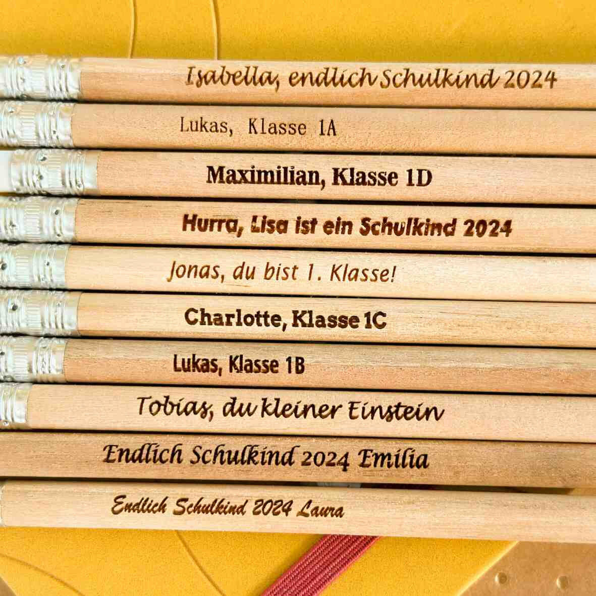 Personalisierter Bleistift mit Gravur und Radiergummi.