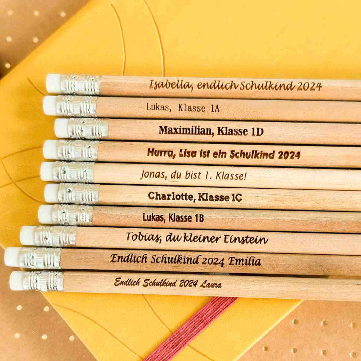 Personalisierter Bleistift mit Gravur und Radiergummi.