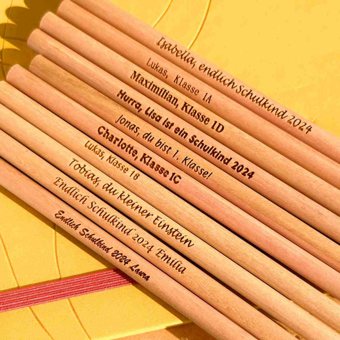 Personalisierter Bleistift mit Gravur und Radiergummi.