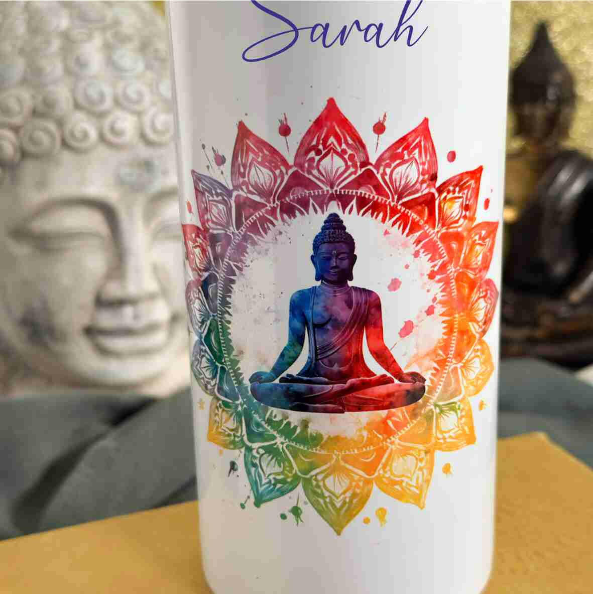 Thermoflasche weiß Buddha bunt.